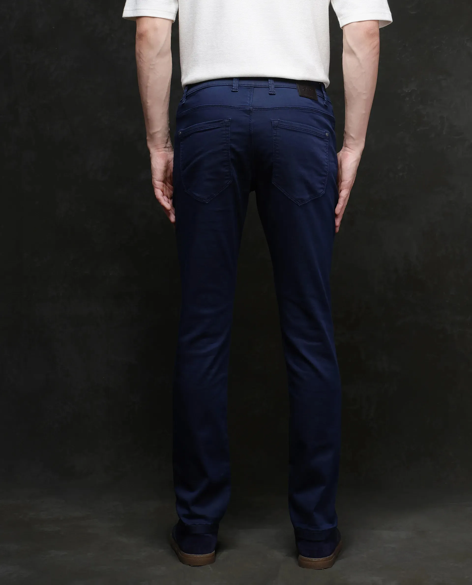 Rare Rabbit Men Corvo Blue Cotton Polyester Fabric Slim Fit Plain Denim Pant